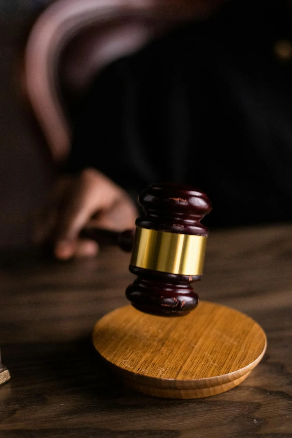 Judge hitting gavel

