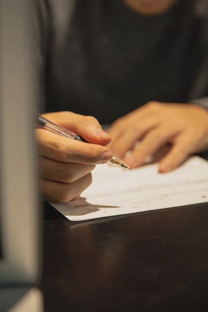 Individual signing a contract